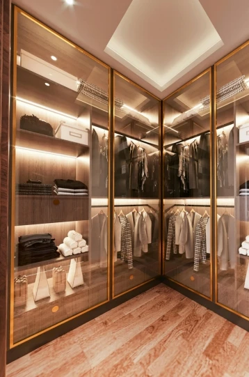 Luxury built in wardrobe seamlessly integrated into bedroom interior