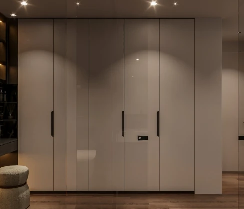 Elegantly designed custom wardrobe for a modern Dubai bedroom